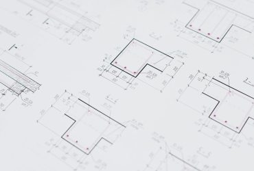 pexels photo 4458200 4458200 High-resolution close-up of detailed architectural blueprints showcasing precision design layouts.